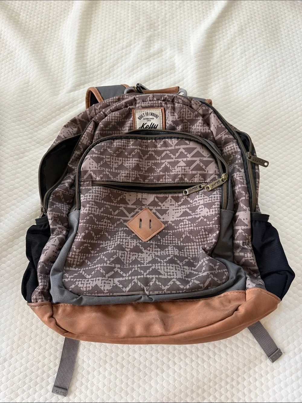 Brown Patterned Men's Backpack with Tan Trim